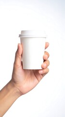 Hand holding a blank disposable coffee cup