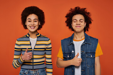 Bright vibes with young individuals showcasing style and positivity against a vibrant background