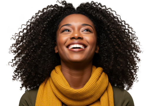 Beautiful young african american woman with curly hair, smiling and looking up, wearing a warm scarf, isolated on transparent background - Powered by Adobe