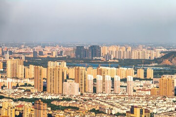 Aerial View of Huzhou China Summer Cityscape with Modern Architecture and Urban Development