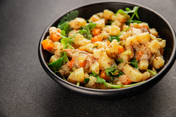 Potato salad with smoked fish tasty snack fresh delicious gourmet food background on the table...