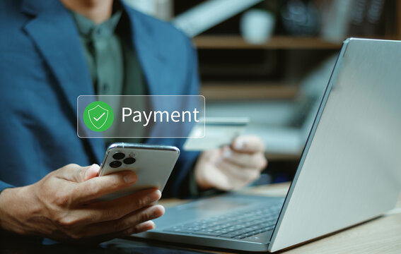 Secure online payment, Digital banking, Payment successful, Fintech solutions for seamless transactions and data protection, Online banking, Businessman authorizes an online payment via smartphone.