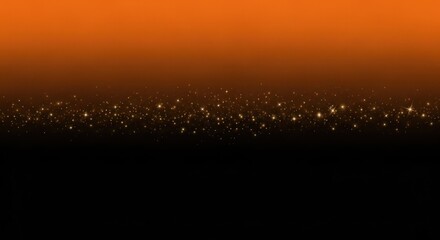 A gradient background with orange on top and black on the bottom with golden glitter in the middle area
