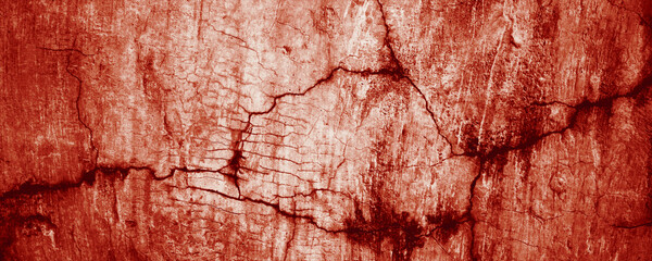 Cracked red stone wall texture for backgrounds, construction concepts, or architectural designs. Adds depth and character. Perfect for rustic themes.