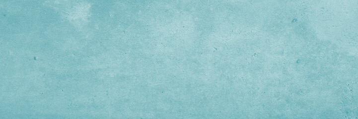 Textured wall in a light greenish blue color, perfect for backgrounds, interior design concepts, websites, and graphic design projects.