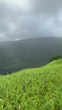 Vertical timelapse of Matheran mountain range with moving clouds, Maharashtra