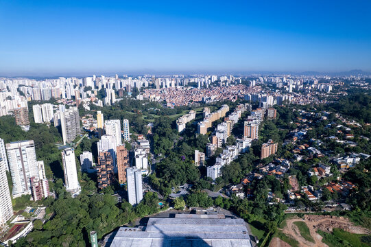 Residential buildings in the Panamby neighborhood, Morumbi, SP. And the Paraisopolis favela behind.