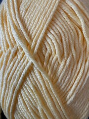 Close up of DK Ball of Yellow Wool 2025