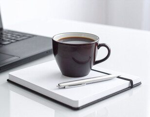 Minimalist Flat Lay Workspace on White Table with Laptop, Notebook, Pen, and Coffee Mug