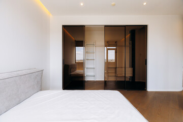 A Modern Minimalist Bedroom Interior Featuring Elegant and Stylish Design Elements