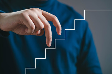 A hand is gracefully reaching towards a stylized staircase, symbolizing progress and the journey toward goals.