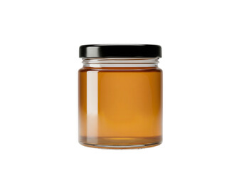 Glass jar filled with orange liquid and black lid isolated on transparent background