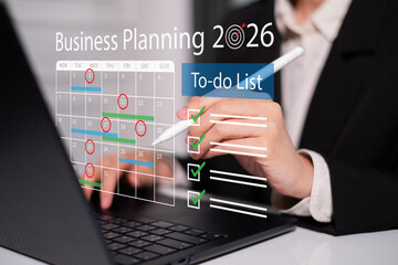 Professional entrepreneur businessman planning 2026 project schedule working on calendar event marketing strategy to boost sales management checklist reminder success goal chart data analysis time