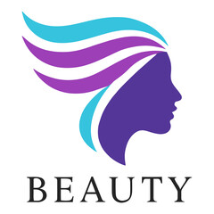 Silhouette of a woman with flowing colorful hair above the word beauty