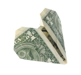 Heart made of dollar banknote isolated on white