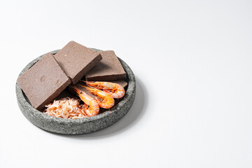 Traditional Indonesian Shrimp Paste Terasi on Mortal Stone