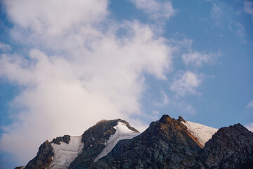 mountain peaks with glaciers on them