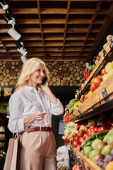 Blonde woman enjoys shopping for fresh organic produce in a local grocery store