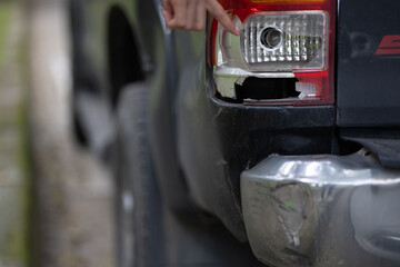 A damaged car on the road after a crash, showing collision impact, danger, injury risk, insurance...