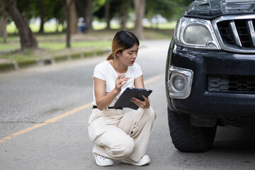 A damaged car on the road after a crash, showing collision impact, danger, injury risk, insurance...