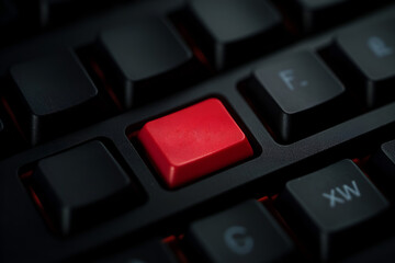 Red key on black keyboard