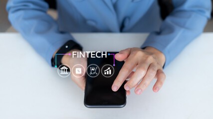 Close-up hand using a smartphone with fintech icons including AI, banking, and analytics. Concept of digital finance, mobile banking, and investment technology.
