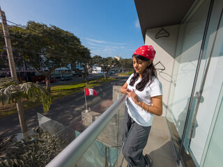 Teen Enjoying Sun on Balcony