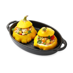 Tasty stuffed pattypan squashes in baking dish isolated on white