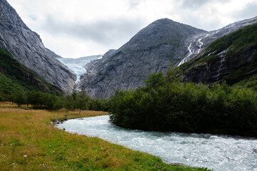 Briksdalsbreen is a glacier arm of Jostedalsbreen and a river, Briksdalsbre, Norway