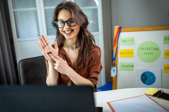 oung Woman Using Sign Language in Video Conference