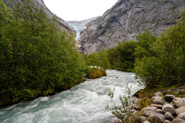 Briksdalsbreen is a glacier arm of Jostedalsbreen and a river, Briksdalsbre, Norway