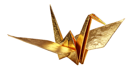 Origami crane made from gold foil paper, isolated on a white background.