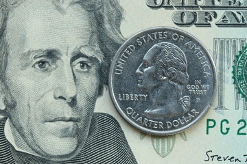 American cent coin on dollar bill close up. United States currency