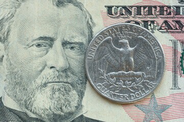 American cent coin on dollar bill close up. United States currency