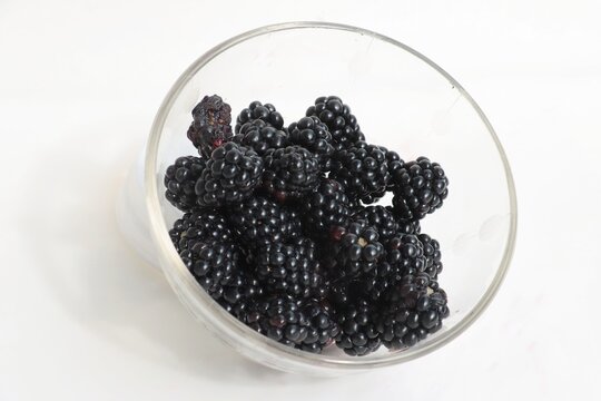 some blackberries in glass pota as dessert