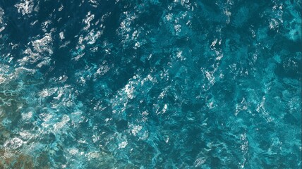 Fototapeta premium Aerial view of clear turquoise ocean water. AI generated