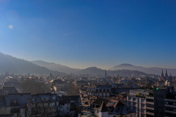 View over freiburg germany with the mountains of the black forest in the background