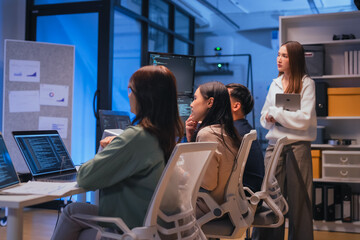 business meeting brainstorm at nightour programmer highlighted how AI and automation will drive the...