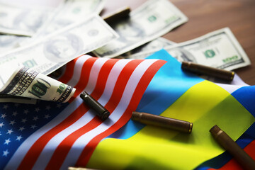 The concept of support in a military conflict. Solidarity. Politics. The flags are on the table.