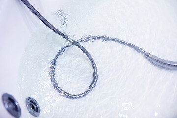 Soap bubbles background. Shampoo foam in the water in the bathroom. Jacuzzi elements.