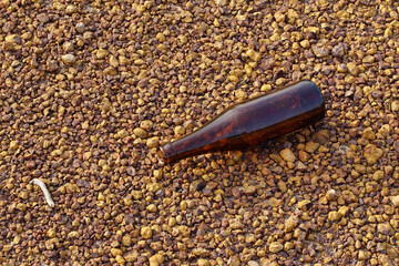 Garbage glass bottles on the floor 