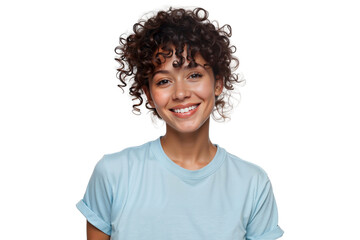 Beautiful smiling woman with curly hair looking directly at the camera, wearing a casual light blue t-shirt, isolated on white background
