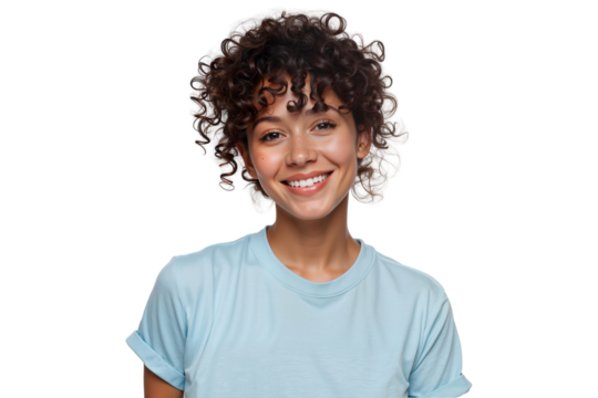 Beautiful smiling woman with curly hair looking directly at the camera, wearing a casual light blue t-shirt, isolated on white background