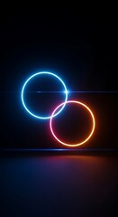 Photo two glowing neon rings, one blue and one pink, intersecting in the dark