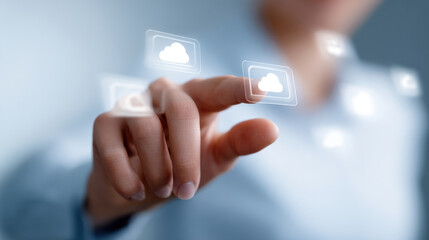 Person interacts with floating digital cloud icons, symbolizing modern technology and data storage. image conveys innovation and connectivity in digital environment