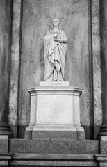 Ancient white marble statue representing one of the apostles of Jesus Christ