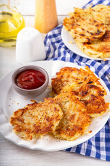 Homemade Hashbrown, Potato pancakes, fried crispy grated potato patties. Traditional dish of American, German cuisine. ideas comfort fall food lunch or brunch, Oktoberfest or Thanksgiving day breakfas