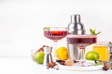Tasty sweet sour aromatic hibiscus  cocktail with alcohol, spices, honey, lemon or lime juice, copy space 