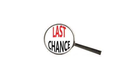 Last chance symbol. Concept word Last chance on beautiful magnifying glass. Beautiful white paper...