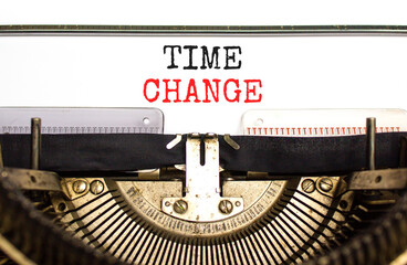 Time change symbol. Concept word Time change typed on beautiful old retro typewriter. Beautiful...